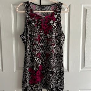 White House Black Market sleeveless long top to wear with leggings. Size L